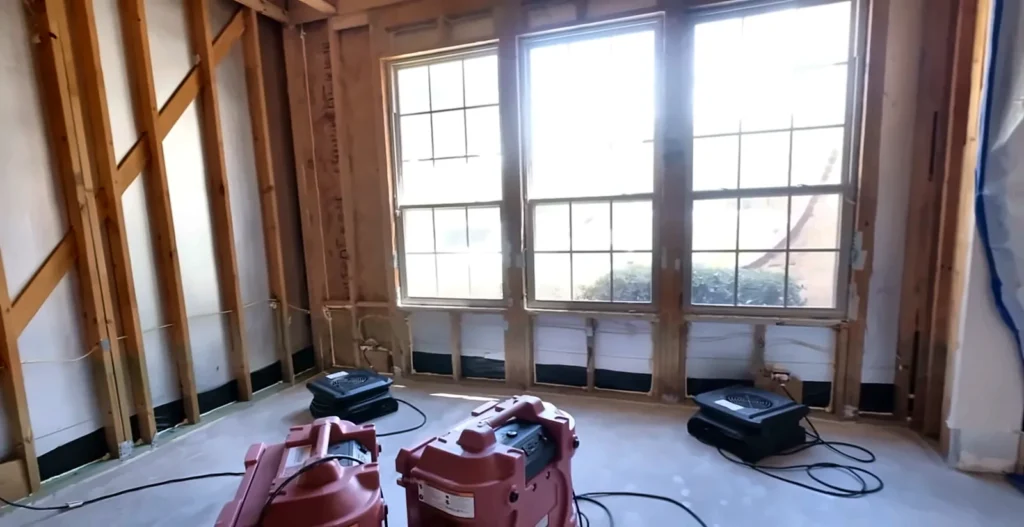 Lehigh Acres water damage restoration: stripped walls and drying equipment during water damage restoration