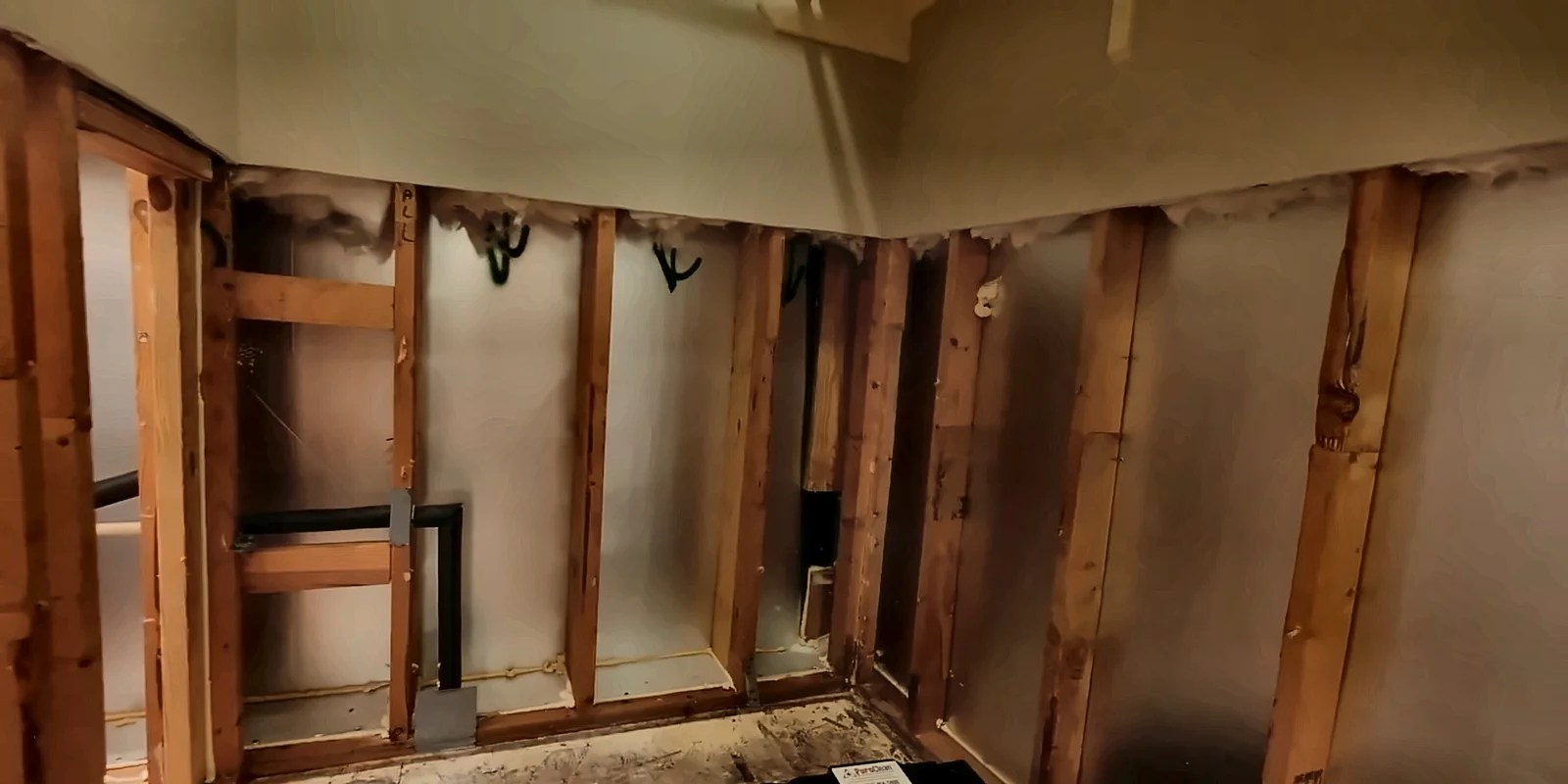 Flood-cut walls drying after cat 3 water damage in Lee County