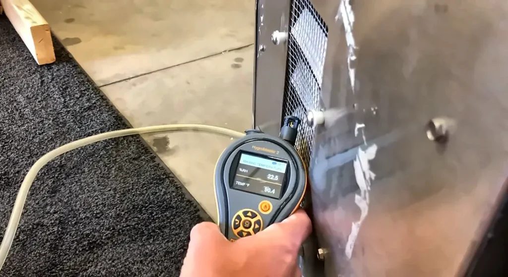 Moisture meter reading logged on a wall for a Florida mold license assessment