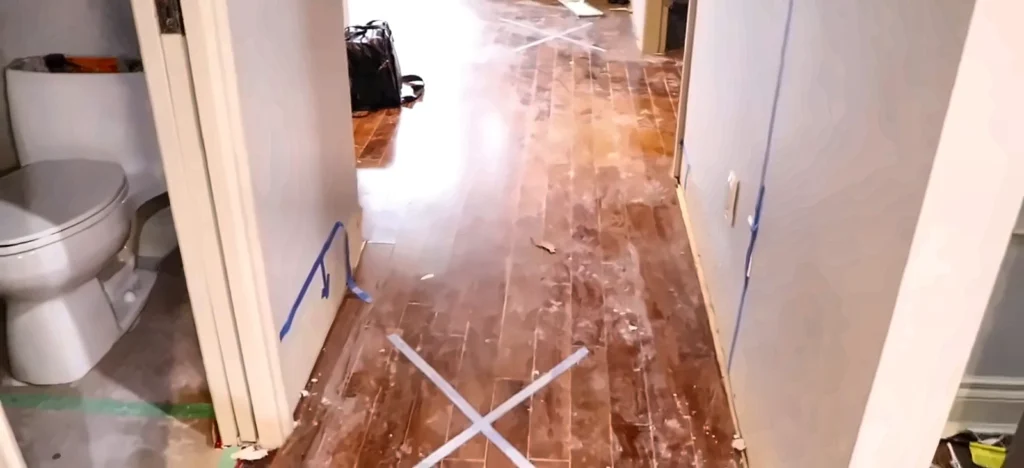 Water damage restoration Naples: water damage restoration in Naples: wet hardwood floor marked for drying