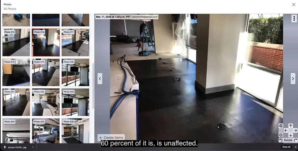 Condo water damage Fort Myers: technician photographing water damage for a condo insurance claim